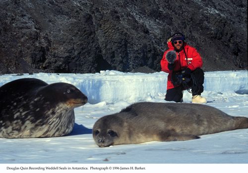 Caption: Douglas Quin recording Weddell seals in Antarctica [Photo Credit: Jim Barker]