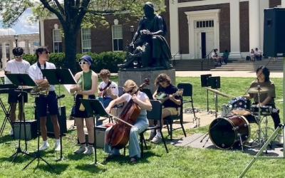 Students playing music on the Lower Lawn