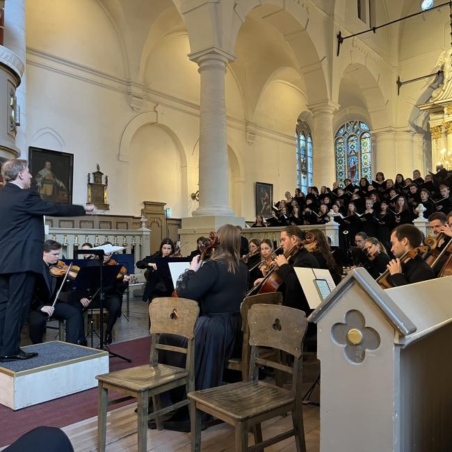 University Singers performing Mozart's Requiem in St. John's Church in Riga, Latvia