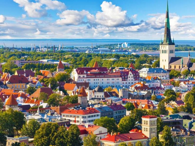 Aerial view of scenic Estonian town, sea and clouds