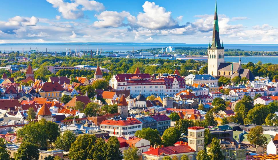 Aerial view of scenic Estonian town, sea and clouds